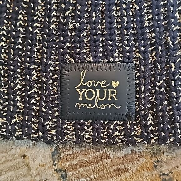 Love your melon beanie with black leather patch. Black and metallic gold, like - Picture 2 of 3